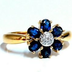 Petite Cluster Blue. 1.00ct Natural Oval Cut Sapphire Ring. Deep Midnight Blue Colors Clean Clarity & Transparent. 3.5 X 2mm .05ct Natural Round Diamonds. I-Color Si-2 Clarity. 14kt. Yellow Gold 3.9 Grams Ring Current Size: 7.25 Depth Of Ring: 6.4mm (Free Resize Service, Please Inquire) Vintage Cluster Ring, Romantic Rings, Tanzanite Diamond Ring, Pink Tourmaline Ring, Pave Diamond Ring, Black Sapphire, Blue Sapphire Diamond, Halo Diamond Ring, Natural Blue Sapphire