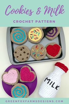 crocheted cookies are on a plate next to a bottle of milk and an oven mitt