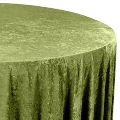 a round table with a green cloth on it