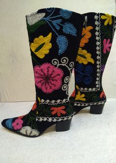 Hand embroidery genuine leather custom made suzani boots. There is colorful floral pattern on black velvet suzani.  There is every size is available 6 us to 10.5 us, 36 eu to 42 eu. #cowboyboots #cowgirl #suzaniboots #bohosyle #botas Bohemian Leather Boots With Floral Embroidery, Bohemian Embroidered Boots For Festival, Traditional Black Boots For Fall, Multicolor Embroidered Leather Boots, Traditional Black Fall Boots, Multicolor Embroidered Boots, Handmade Bohemian Boots For Fall, Traditional Handmade Leather Boots, Bohemian Embroidered Boots With Round Toe