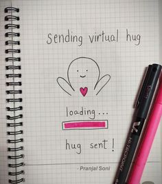 a notepad with writing on it and a pink pen next to it that says sending virtual hug loading hug sent