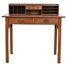 a wooden desk with two drawers on one side and an open drawer on the other