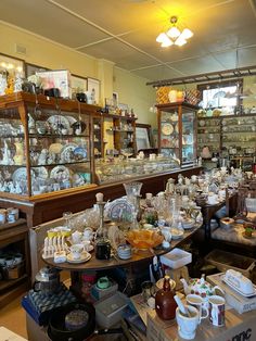 a room filled with lots of different types of glassware