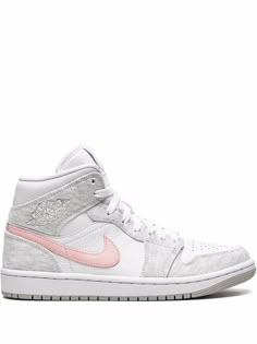 the nike air jordan 1 mid is available in white, pink and grey with a metallic toe