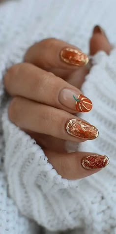 22. Orange Pumpkin Nails with Gold Accents On the hunt for autumn nails look? Update your nails for autumn with our roundup of the... Bee Nails, Makeup Hacks Beauty Secrets, Pumpkin Nails, Fall Nail Art Designs, Nagel Tips, Thanksgiving Nails, Fall Nail Art, Festival Nails