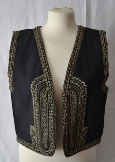 Zara Embroidered black waistcoat Sizes available: S Composition: OUTER SHELL MAIN FABRIC 100% Cotton Any question, please feel free to ask me. Thank you for visiting my shop! Embroidered Festival Vest, Embroidered Sleeveless Vest For Festival, Elegant Embroidered Festive Vest, Bohemian Black Embroidered Vest, Black Floral Embroidery Sleeveless Vest, Elegant Embroidered Sleeveless Vest, Folk Style Fitted Festival Vest, Elegant Embroidered Fitted Vest, Elegant Fitted Embroidered Vest