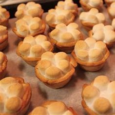 there are many small pies on the baking sheet