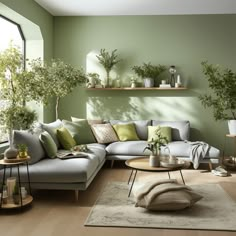 a living room filled with lots of furniture next to a large window and potted plants