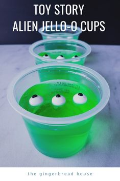 three green cups with white balls in them and the title toy story alien jello - o'cups