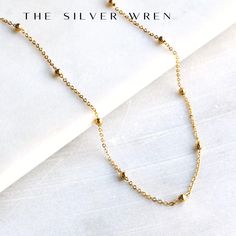 This dainty gold chain necklace, perfect for layering or a minimalist look. D E T A I L S *18kt gold plated -lead, nickel & cadmium free *Heavy plating, tarnish resistant, water friendly LENGTH  - Please select from the drop down selection. - The standard length is normally 18". - Model is wearing 16" in Photos. HOW TO PERSONALIZE *Select your choices from the drop down menu to create your custom design. ∙ EXTRA LOVE ∙ Handcrafted just for you in sunny Arizona by a team of talented women. All of Gold Necklace Women, Gold Chain Necklace, Simple Necklace, Chains Jewelry, Gold Chains, Chains Necklace, Womens Necklaces, Chain Necklace, Gold Necklace