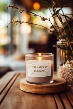 a candle sitting on top of a wooden table