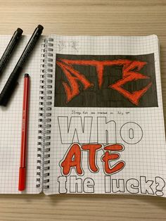 a notebook with the words who ate the luck written on it next to a pen