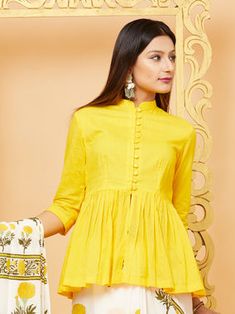 Yellow Mulmul Peplum Blouse Kurti Inspiration, Jins Top, Wedding Garments, Kurti Short, Peplum Top Outfits, डिजाइनर कपड़े, Cotton Tops Designs, Short Frocks, Short Frock