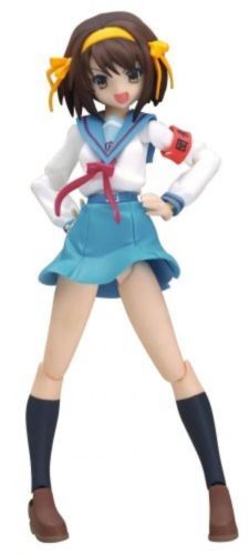 an action figure is posed with her hands on her hips and wearing a blue dress