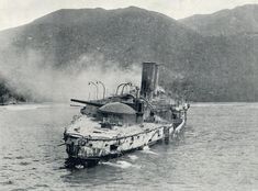 an old photo of a battleship in the water