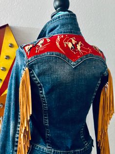 Reworked Ladies True Religion Emily Denim Jacket  Blue Denim  Tan Natural Grain Cow Leather Fringe  Red and Cream Cotton Fabric Details (100% Cotton) Jacket 99% Cotton 1% Elastine 18" Pit to Pit 22" Long from Collar Seam to Bottom Hem Western Boho Outfits, Western Denim Jacket, Denim Bracelet