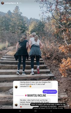 two women walking up some stairs in the woods