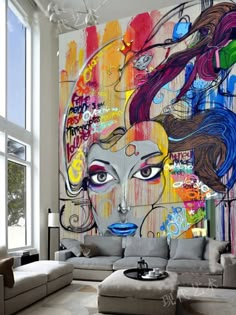 a living room filled with furniture and a large painting on the wall