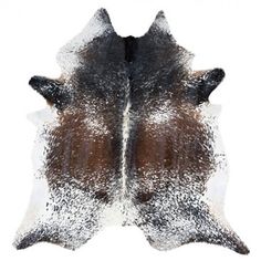 two brown and white cowhides are shown on a white background with black spots