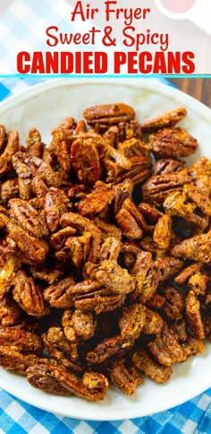 candied pecans on a plate with text overlay that reads air fryer sweet and spicy candied pecans