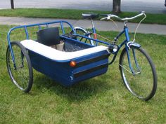 a blue bike with a trailer attached to it