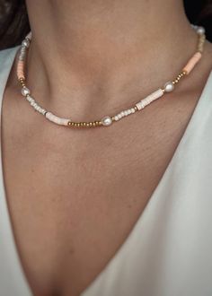 Necklace made of Katsuki beads, Toho beads and Natural Pearls. Clasp made of gold-plated sterling silver Length: 38, 40, 42, 45 or 50 cm. The size of the beads: approx. 2-4 mm. A perfect holiday necklace! A combination of Katsuki beads in beautiful light orange and cream colors, Toho beads in white and gold and Natural Pearls. The perfect idea for a holiday accessory. It will blend in beautifully with holiday stylizations and bathing suits. Vivid colors are currently incredibly fashionable, they add character and charm. The necklace also has a 3 cm extension. It is possible to make any size on request. Jewelry With Clay Beads, Beaded Necklace Layering, Beaded Bracelets And Necklaces, Everyday White Jewelry With Polished Beads, Everyday White Polished Beads Jewelry, Colorful Beads 14k Gold-filled Jewelry Gift, Beaded 14k Gold Filled Necklace With Round Beads, Beaded 14k Gold Filled Round Necklaces, Gift Jewelry With Colorful Beads In 14k Gold