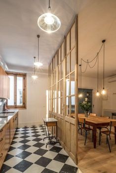 the kitchen is clean and ready to be used as a dining room or office space