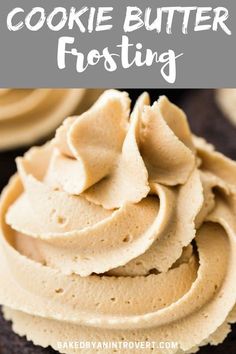 a close up of a cupcake with frosting on top and the words cookie butter frosting above it