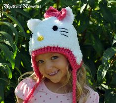 This hat is just too cute for wordsCrocheted in a super soft yarn, this hat is as cute as it is warm.  It has long ties with pom pom ends.  Custom made in your size.  Colors of the trim and bow can be changed upon request.  NB-Adult.    Thanks for looking.. Hello Kitty Hat, Crochet Cat Hat, Crocheted Cat, Custom Crochet, Cat Hat, Crochet Cat, Crochet Basics, Soft Yarn, Caps Hats