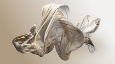 an abstract image of flowing fabric on a beige background with room for copy - up text