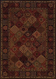 a red and black rug with an ornate design on the center, surrounded by many different colors