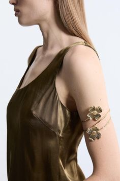 Add Intricate Detail To Any Occasion Look With Our Arm Cuff. Featuring A Large, Floral Design, This Cuff Is Perfect For Injecting Some Personality Into Your Look. Wear Them On Wedding Guest Days, To Party Nights, And Holiday Evenings. Metal Flower Arm Cuff Shimmering, Metallic Colouring Three Dimensional Floral Detailing Unique Cuff Design Statement Large Size Flower Arm Cuff, Arm Cuff Jewelry, Gold Arm Cuff, Petite Wedding Guest Dresses, Latest Bracelets, Design Journal, Cuff Design, Arm Cuffs, Fall Wedding Guest