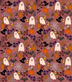 a halloween pattern with ghost, pumpkins and other items on it's surface