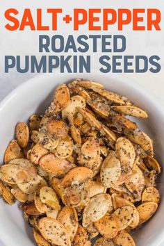 salt and pepper roasted pumpkin seeds in a white bowl