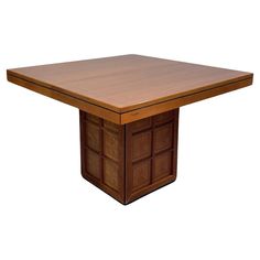 a large wooden table with two drawers on each side and one drawer at the top