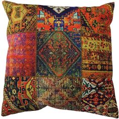 a multicolored patchwork pillow with many different colors and patterns on the front