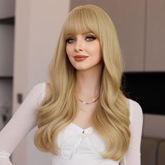 Whether you want to change your daily hairstyle or need a quick and easy fix for bad hair, this wig is perfect for you. We have carefully selected a wide range of styles and colors of wigs made of high quality synthetic fibers to ensure a natural and realistic look, comfortable to wear and easy to take care of. -- Product Features: ● High simulation material: made of high quality synthetic fiber with natural texture, soft touch and ironable finish. ● Variety of styles: from classic long straight hair to fashionable curls, from natural hair color to bold color, a wide variety, there is always one for you. The bangs design adds a touch of elegance, perfectly complements your face shape and highlights your natural features. ● COMFORTABLE TO WEAR: The inner mesh design is lightweight and breat Natural Curly Wig, Wigs Party, Blonde Natural, Wigs Curly, Wigs Cosplay, Party Wigs, Natural Looking Wigs, Natural Blonde, Wigs Synthetic