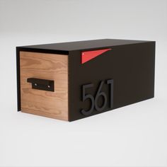 a black mailbox with the number sixty on it