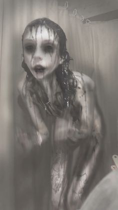 a woman with white paint on her face and body is standing in front of a shower curtain