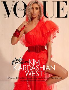 a woman in a red dress on the cover of a magazine