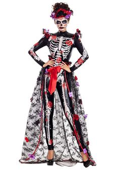 a woman in a skeleton costume with flowers on her head and red ribbon around her waist