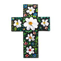 a cross with flowers painted on it