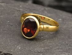 Gold Garnet Ring set with a Natural Garnet in a perfect diamond cut & a deep red color, at 10x8mm, 3 Carats, sourced from Mozambique.  Red Antique Ring design made of Gold Vermeil ☞ thickest 18k Gold Plating on top of Solid 925 Sterling Silver ☞ made to last. ☞ Choose your size ☞ I resize (before shipping) for FREE to Any size* Matching Earrings & Matching Pendant - please ask me January Birthstone - Genuine & Natural Stones ❀ ⌛Last Ring left ⌛   ❀ Each Natural Gem is unique & will have Slight v Oval Ring Gold, Garnet Gold Ring, Solitaire Ring Oval, Gold Garnet Ring, Gold Finger Rings, Garnet Red, Garnet And Gold, Antique Ring, Real Jewelry