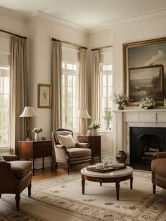 a living room filled with furniture and a fire place in front of a painting on the wall