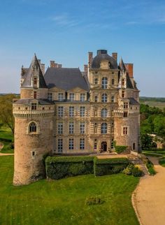 an aerial view of a castle in the countryside