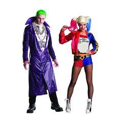 two people dressed in costumes standing next to each other