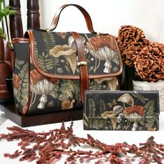 Wild Forest mushroom Forager Canvas Doctor bag and wallet gift set, Cottagecore Hippie crossbody bag, boho tapestry fabric shoulder bag .: 19.05 Oz, made from durable nylon fabric .: Features a portable black handle and removable strap .: Smooth magnetic buckle for easy opening and closing .: Dimensions: 10.2"(L) x 4.72"(W) x 7"(H) .: Large capacity with two open pockets and a small zip pocket .: Ideal for storing mobile phones, keys, and cards securely ❣️Actual colours may vary. This is due to Cottagecore Bag, Boho Tapestry, Wild Forest, Doctor Bag, Tapestry Fabric, Wallet Gifts, Black Handle, Cross Body Handbags, Purses And Handbags