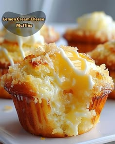 lemon cream cheese muffins on a white plate