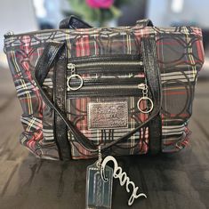 Coach Poppy Shoulder Glam Tote. Style Number: 14360 Zipper Closer. Front Has 2 Small Zipper Pockets. Color: Black, Red, Blue, Green & Yellow Handles Have About 10" Drop. Inside Lining Is Red. Inside Of Bag Has A Zipper Pocket, 2 Multi Function Pockets And A D Ring. Doesn't Come With Dustbag. Has 2 Hangtags. Condition: In Excellent Used Condition. Inside Top By Zipper Has A Little Wear. Otherwise Looks Fantastic. See Photos For Full Condition Coach Red Shoulder Bag With Adjustable Strap, Red Coach Bag With Double Handle, Red Coach Shoulder Bag For On-the-go, Red Satchel Bag With Silver-tone Hardware, Black Coach Bag With Silver-tone Hardware, Coach Poppy, Shoulder Handbag, Red Blue Green, Handbag Purse