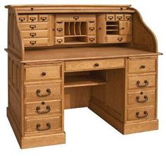 an old fashioned wooden desk with drawers